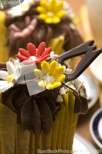 Image of Spring muffins decorated with flower petals with tulips 