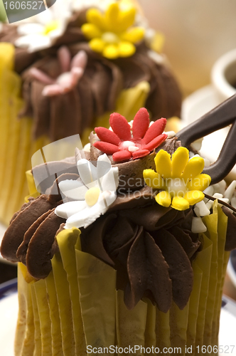 Image of Spring muffins decorated with flower petals with tulips 