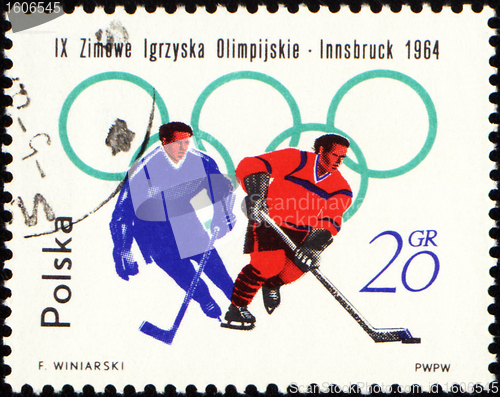 Image of Two hockey players on post stamp