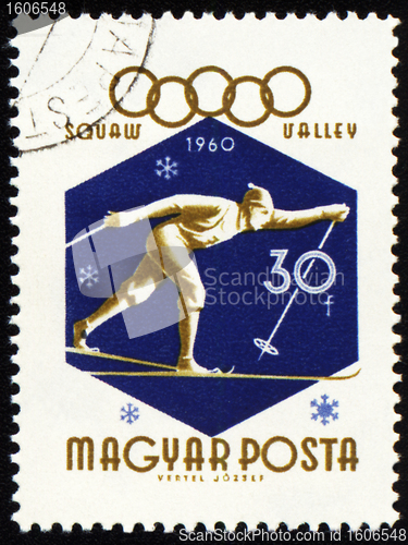 Image of Running skier on post stamp