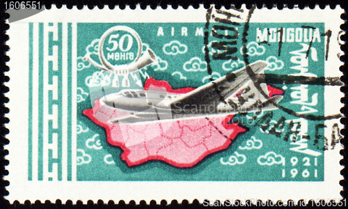 Image of Flying air liner and map of Mongolia on post stamp