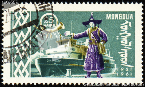 Image of Passenger ship and man in national Mongolian costume on post stamp