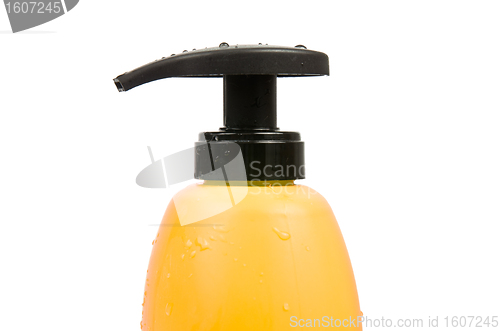 Image of Close up of yellow shampoo bottle cap