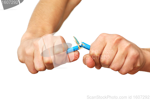 Image of Hands breaking pencil