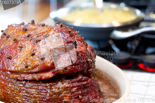 Image of Spiral Cut Hickory Smoked Ham on Cooking Stove Top