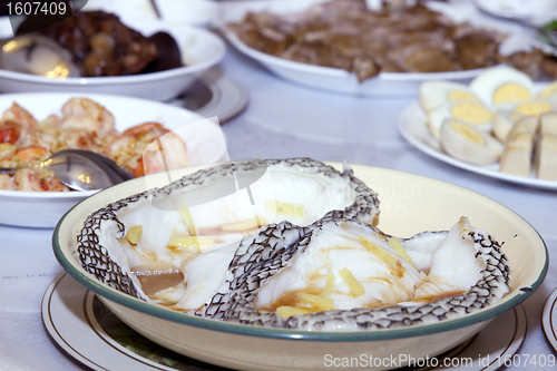 Image of Steamed Sea Bass Fish with Ginger and Soy Sauce