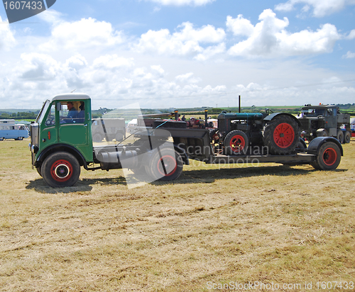 Image of Old Articulated Lorry and Farm Tractor