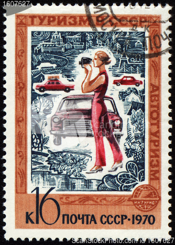 Image of Woman with the camera on post stamp