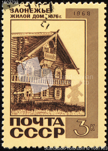 Image of Old wooden house on post stamp