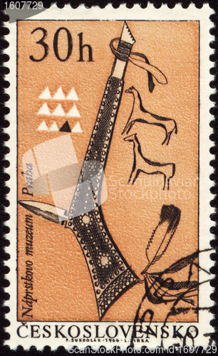 Image of Tomahawk of American indian on post stamp