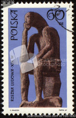 Image of Statue of seated man on post stamp