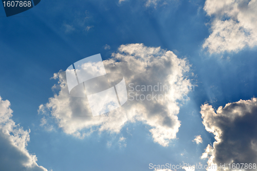 Image of Blue sky with clouds and rays of sun