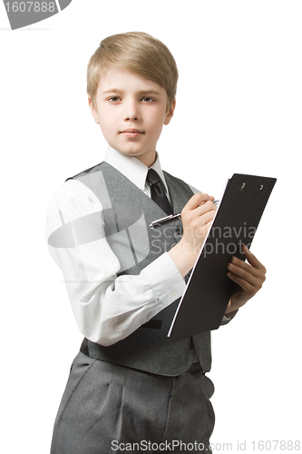 Image of Boy  in uniform  suit with clipboard and pen