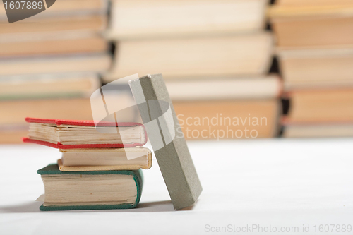 Image of vintage small books, on white background