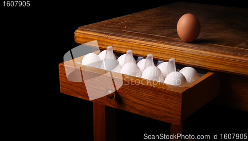 Image of eggs on old table