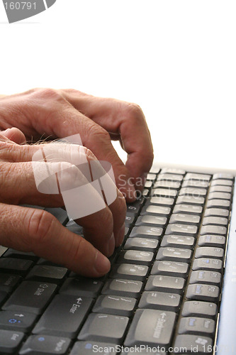 Image of Male Hands Typing