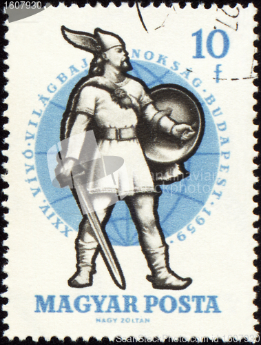 Image of Ancient warrior with sword on post stamp