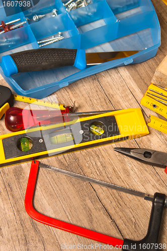 Image of Working tools on a board, a close up