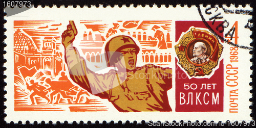 Image of Soviet officer with a pistol in battle on postage stamp