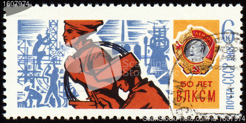 Image of Young workers on postage stamp