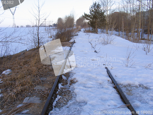 Image of Railway covered the melting snow