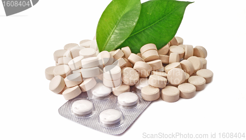 Image of Pills tablets medicine bio with green leaf