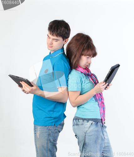 Image of A young couple with a Tablet PC