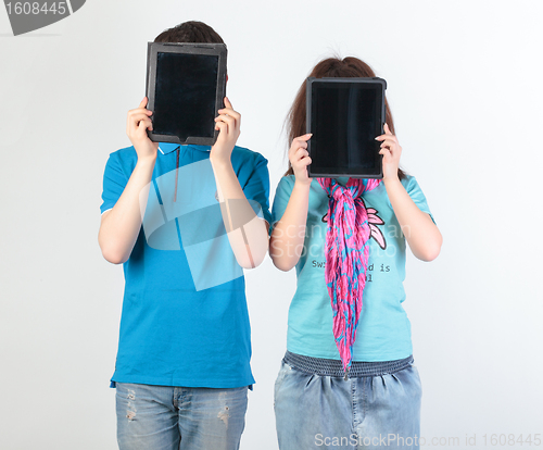 Image of A young couple with a Tablet PC