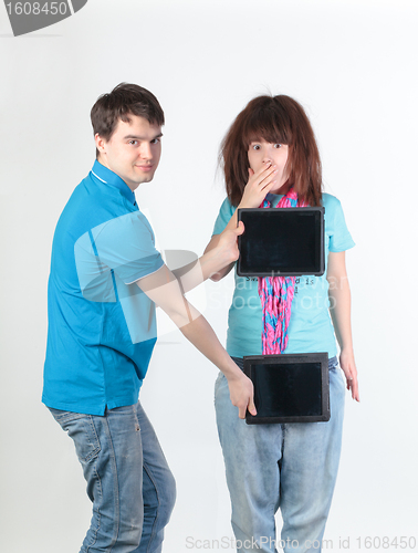 Image of A young couple with a Tablet PC