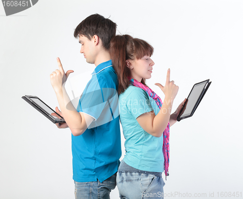 Image of A young couple with a Tablet PC