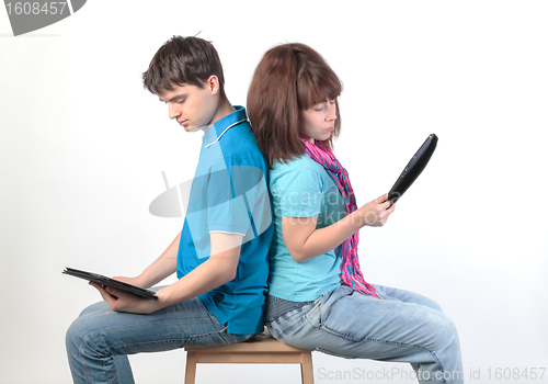 Image of A young couple with a Tablet PC