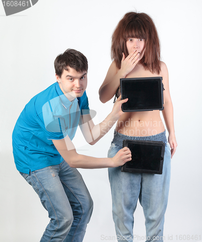 Image of A young couple with a Tablet PC