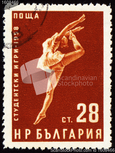 Image of Dancing young woman on post stamp