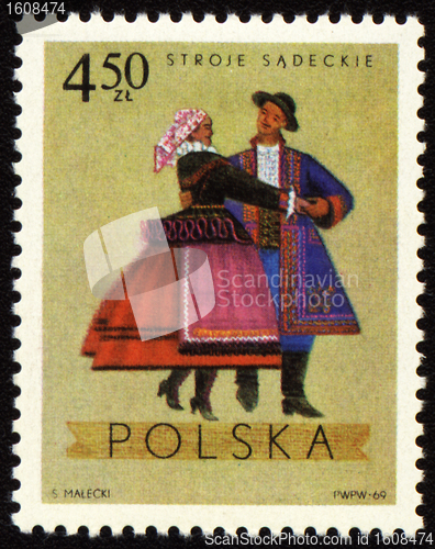 Image of Polish folk dancers from Sadecki region on post stamp
