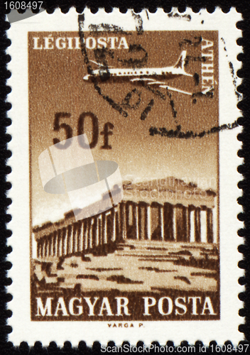 Image of Flying plane above the Athens on post stamp