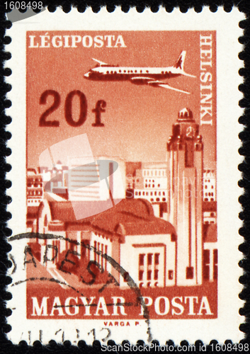 Image of Flying plane above the Helsinki on post stamp