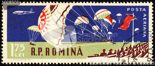 Image of Parachutists landing in stadium  on post stamp