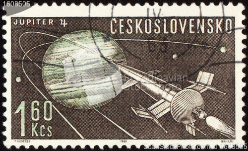 Image of Postage stamp with Planet Jupiter and spaceship