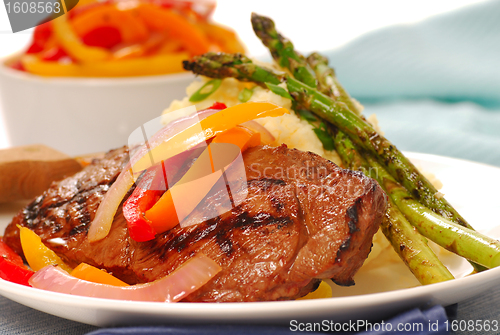 Image of Grilled rib-eye steak with mashed potatoes