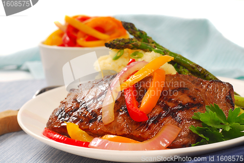 Image of Grilled rib-eye steak with mashed potatoes