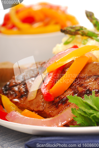 Image of Grilled rib-eye steak with mashed potatoes