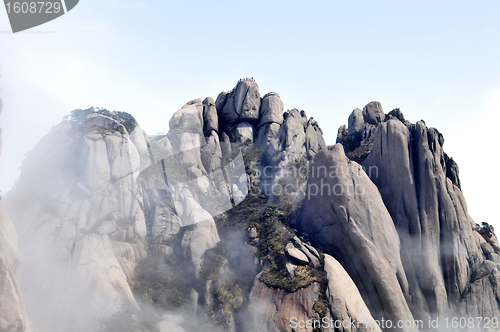 Image of Rocky mountains in the morning fogs