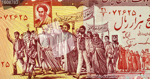 Image of Mullahs Leading Marchers Carrying Posters of Khomeini 