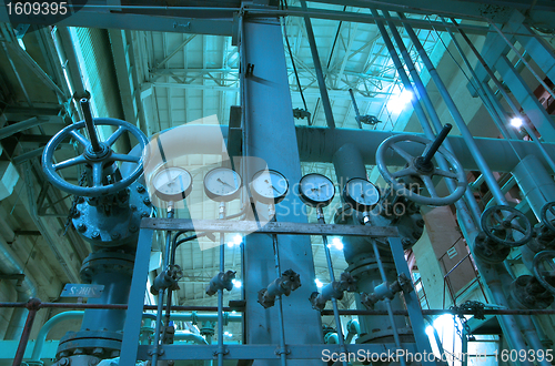 Image of Industrial zone, Steel pipelines and cables in blue tones