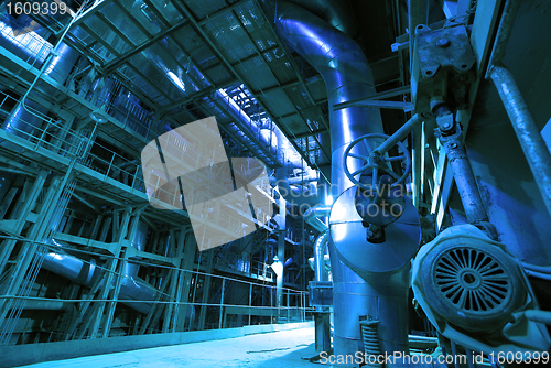 Image of Industrial zone, Steel pipelines and cables in blue tones