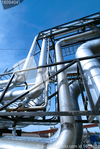 Image of Industrial zone, installation of Steel pipelines and cables in b