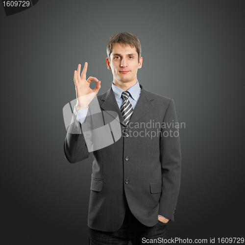 Image of businessman shows OK