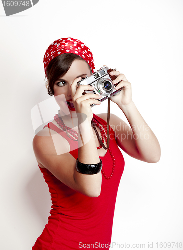 Image of Pin-up girl with a camera