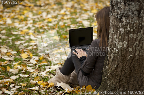 Image of Woman working outdoor