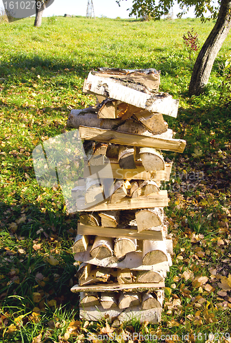 Image of Birch firewood loaded stack Organic fuel fireplace 